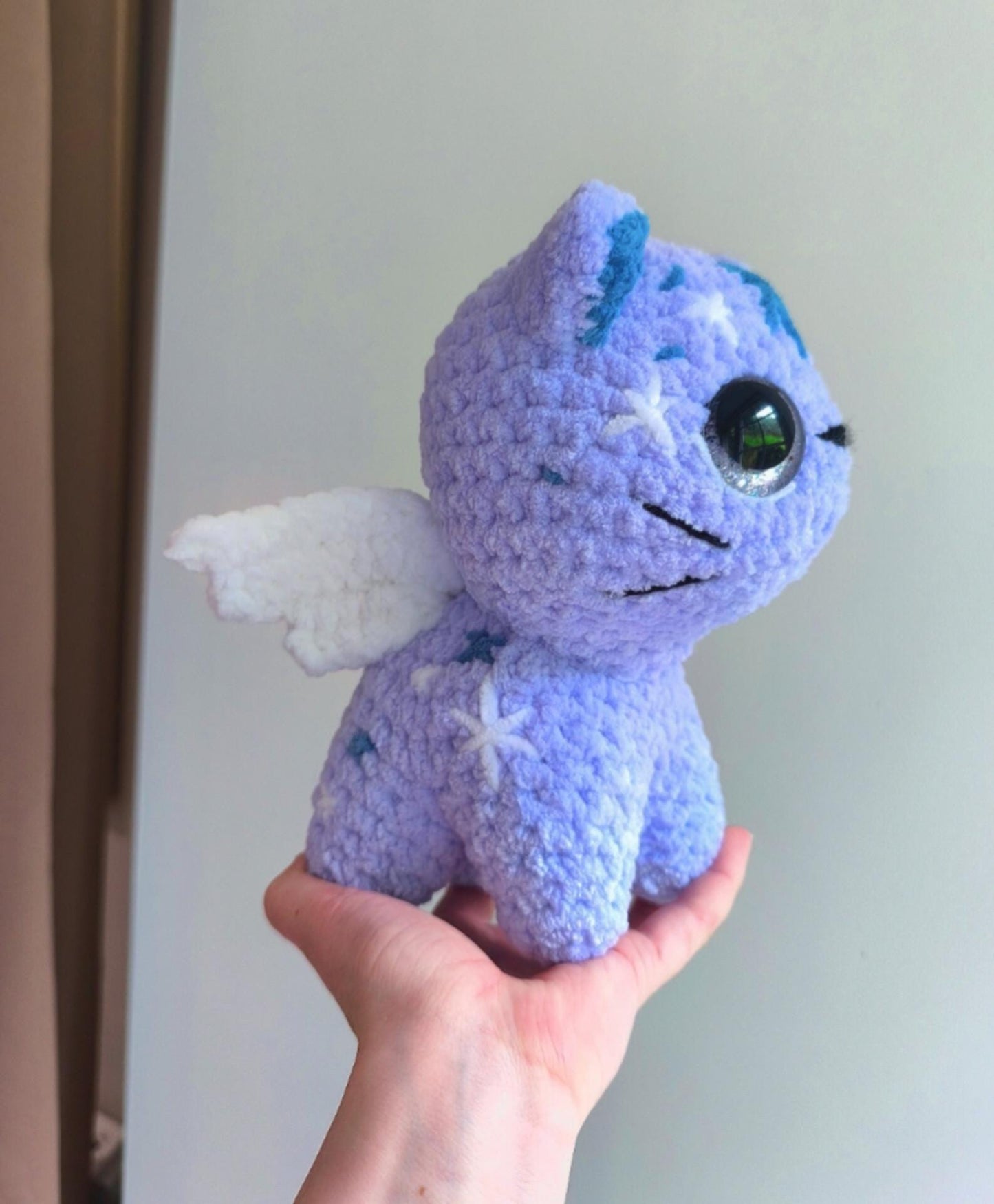 Handmade crochet celestial kitten with hand painted eyes