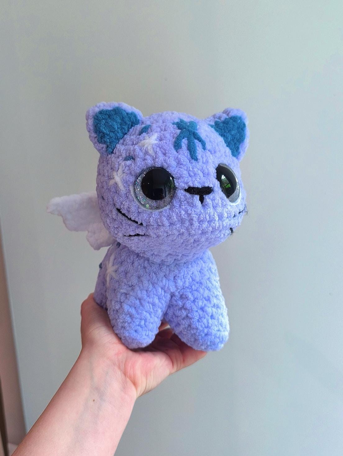 Handmade crochet celestial kitten with hand painted eyes